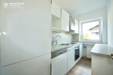 Traumlage! 2-Zimmer-Terrassenwohnung "Kreuzjoch" mit Zugspitzblick + Hobbyraum! - Küche mit Einbauküche